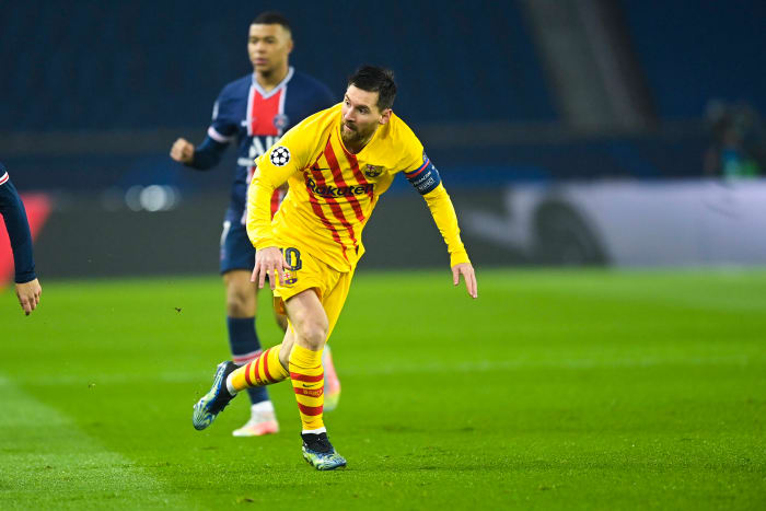 Lionel Messi pictured playing for Barcelona against Paris Saint-Germain in March 2021